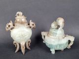 pair of chinese carved jade vases with figures on stands
