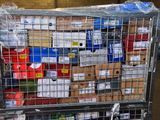 a large metal cart with many boxes on top of it