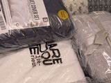 many different types of bedding on display in a store