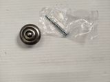 a small metal ball and a screw on a table