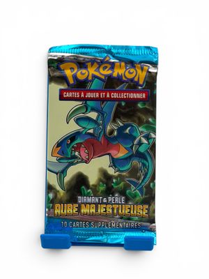 a close up of a blue card case with a pokemon character on it