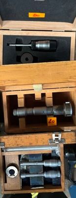 une boîte en bois contenant tout un tas d'outils