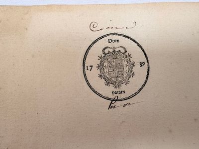 une vieille enveloppe sur laquelle est apposé un timbre et un cachet