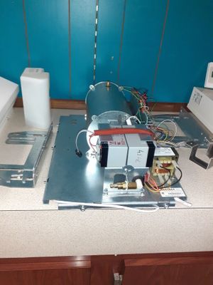 an image of a kitchen counter with a microwave and a toaster