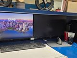 a desktop computer sitting on a desk with a keyboard and mouse