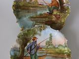 two plates with a picture of a man fishing on them