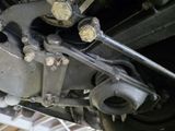 a close up view of the underside of a train car