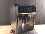 an image of a coffee machine on a wooden table