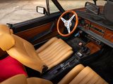 a car that has a steering wheel and some leather seats