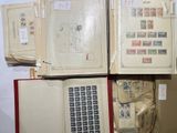 a lot of old books with stamps on them