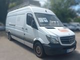 a white van that is parked in a parking lot