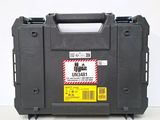 a close up of a black case with a yellow tag on it