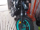 a motorcycle that is parked inside of a building