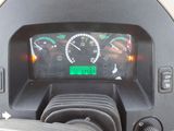 a close up of a car dashboard with a speedometer