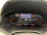 the dashboard of a car with a digital display in the center