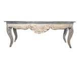 an antique console table with carved legs and a marble top