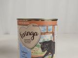 a can of cat food that is sitting on a table