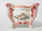 an image of a ceramic planter with a bird on it