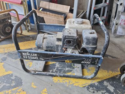 a machine that is sitting on the ground in the garage