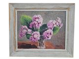 painting of purple flowers in a glass vase on a wooden table