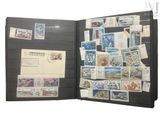 a black folder with a lot of stamps on it