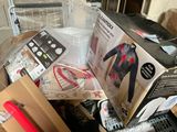 a box of clothing and other items on a table