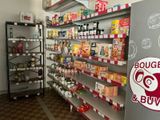 many shelves of food in a store with a sign that says bougie and buuva