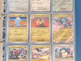 a close up of a binder with a lot of cards on it