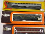 three boxed train cars sitting on top of each other on a table