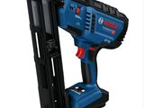 a close up of a cord nailer with a nail gun