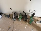many tools that are sitting on the floor in the room