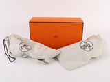an orange box with a pair of glasses sitting on top of it