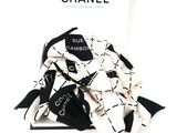 a black and white scarf with a black and white design