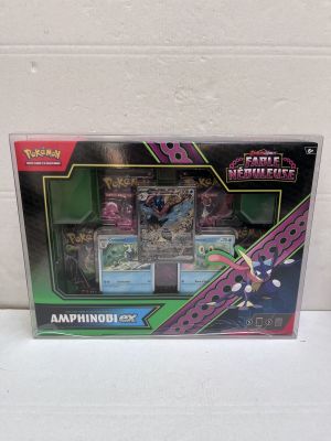gros plan d'une boîte de cartes pokemon sur une table
