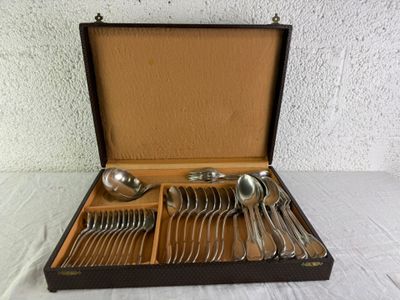 a wooden box with silverware in it on a table