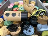 a box full of different types of glasses and bottles
