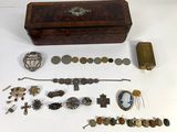 a wooden box that has a bunch of different items in it