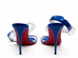 pair of blue and red high heeled shoes on a white surface