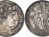 a close up of a coin with an image of a man on it