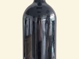 a bottle of wine that is sitting on a table