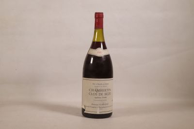 a bottle of wine that is sitting on a table