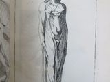 a book with a drawing of a woman holding a baby