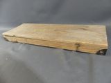 an old wooden box sitting on top of a table