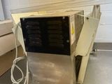 a machine that is sitting on a counter in a kitchen