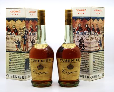 deux bouteilles de Cusinner Cognar et une boîte de Cognar
