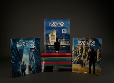 a lot of books that are sitting on a table