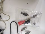 a lot of wires that are laying on a table