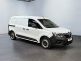 the white van is parked in a large room