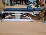a blue and white table in a box in a room