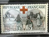 une image d'un timbre sur lequel figure une croix rouge